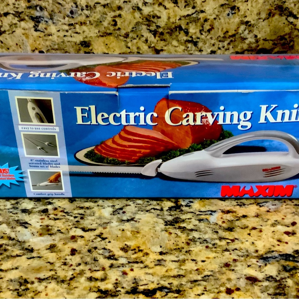 Electric carving knife new, never used.